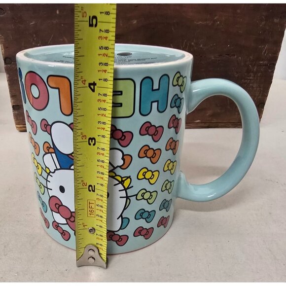 Hello Kitty Ceramic Mug Multi-Colored Bow Print Pastel Blue Pink Interior - Picture 6 of 7